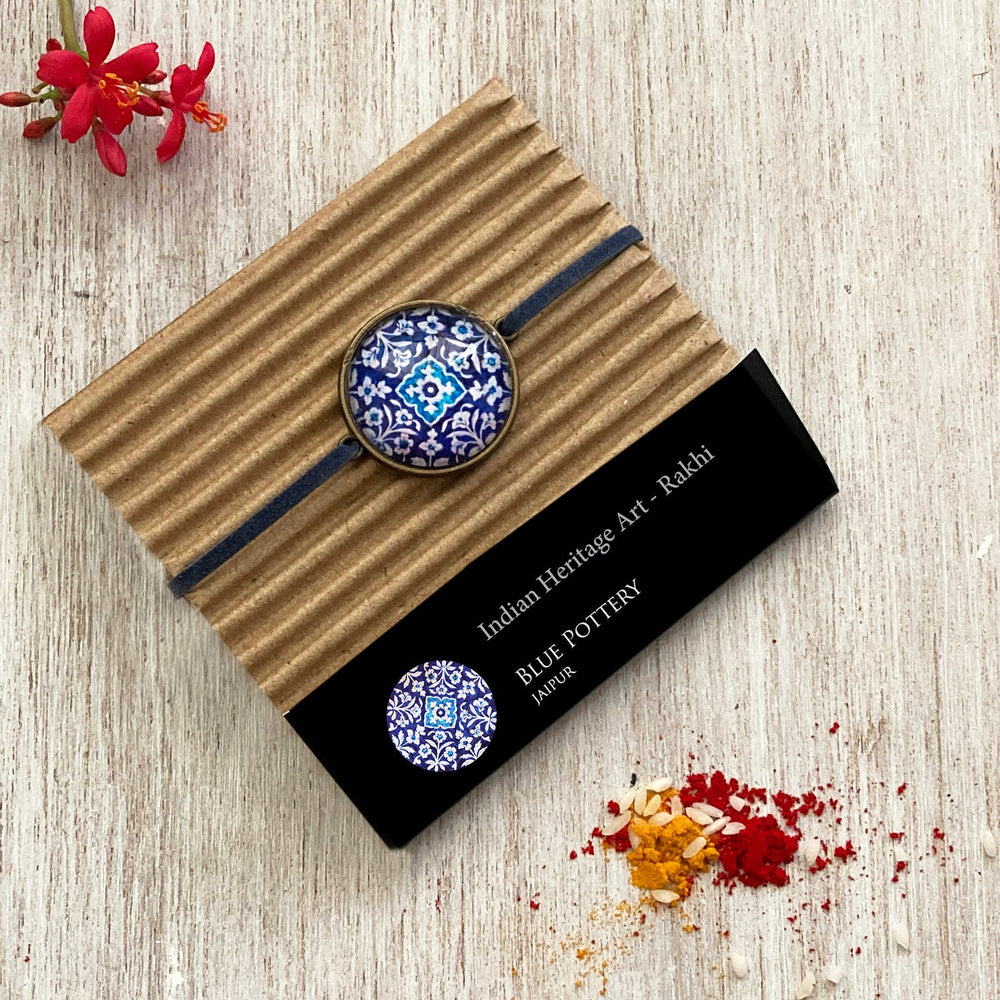 Rakhi Gift Hampers- Blue Pottery - Rakhi with Pill Box and Key Ring