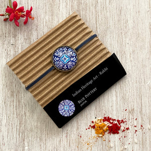 Rakhi Gift Hampers- Blue Pottery - Rakhi with Pill Box and Key Ring