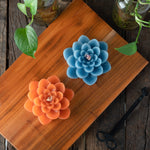 Box Set Of 2 Floral-Scented Lotus Candles (Blue & Orange)