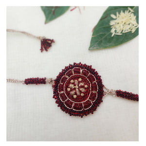 
                
                    Load image into Gallery viewer, Handcrafted Maroon Floral Rakhi
                
            