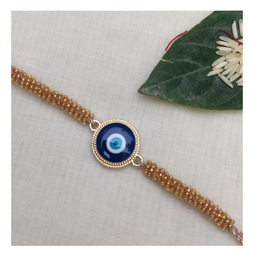 
                
                    Load image into Gallery viewer, Handcrafted Evil Eye Rakhi
                
            